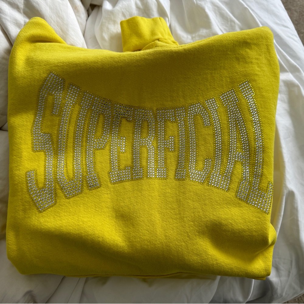 Yellow hoodie with rhinestone letters